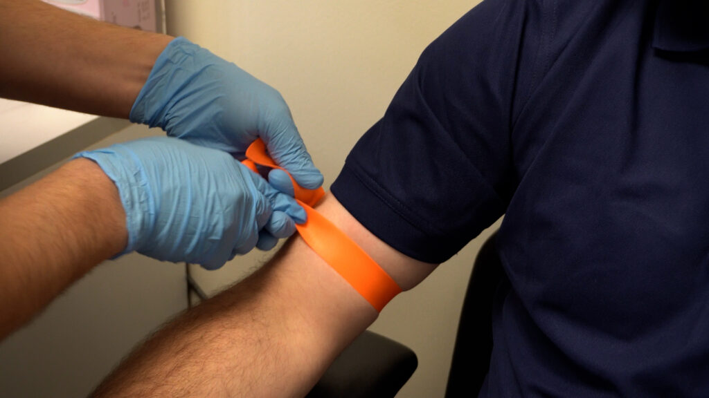 Tourniquet being applied