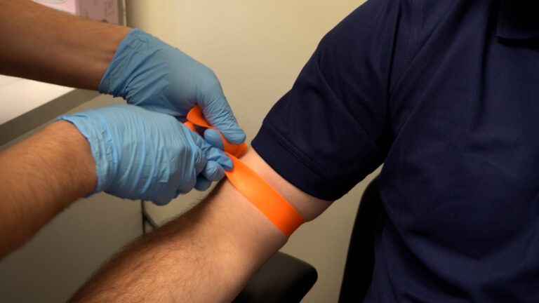 Tourniquet being applied