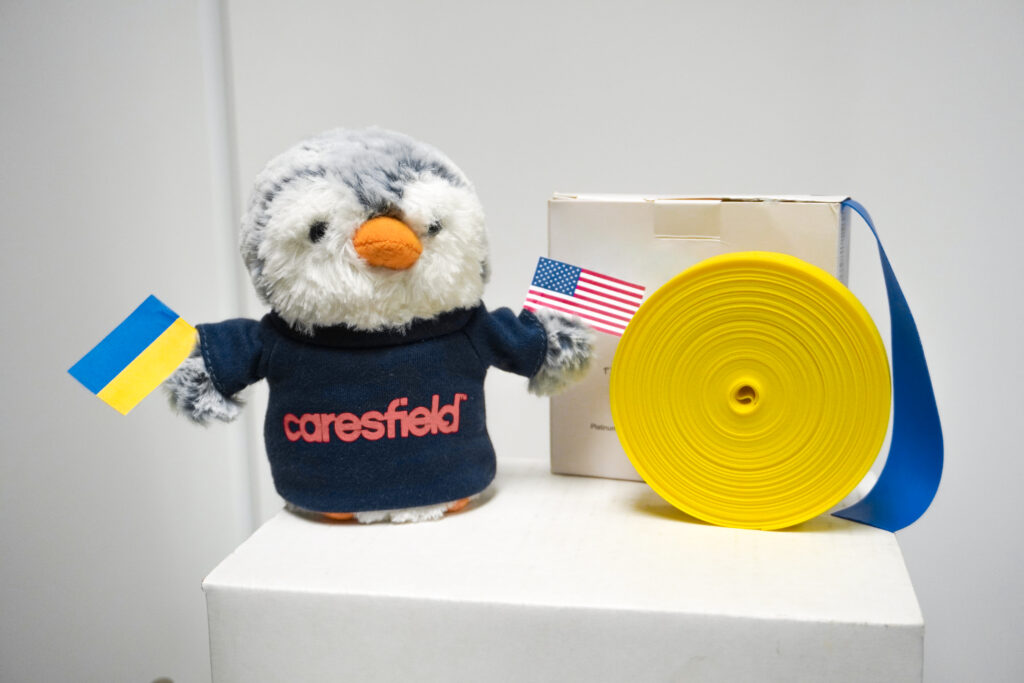 CP the penguin helped pack our donation of disposable tourniquets for Alight. 