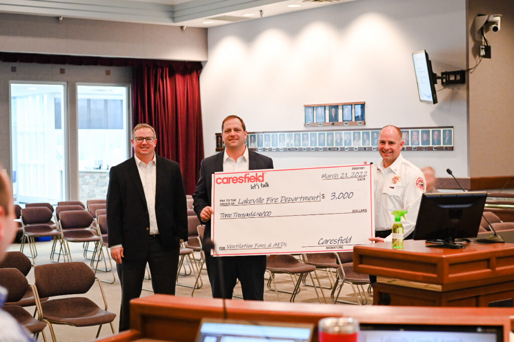 CEO Ron Griffith and COO Steve Griffith presented the charitable donation to the Lakeville Fire Department. 