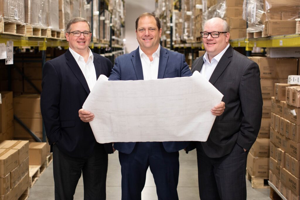 Our owners Ron, Steve and Marty Griffith in the Caresfield warehouse. 